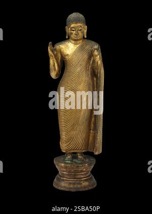 Sculpture antique de Bouddha offrant une protection du milieu du XVe siècle Sri Lanka Banque D'Images