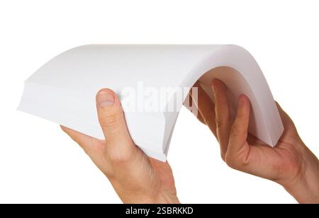 Une pile de papier dans la main isolé sur fond blanc Banque D'Images