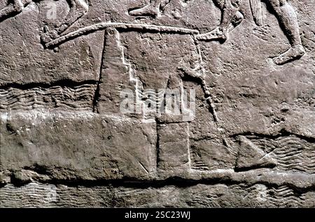 7528. La datation des puits de Mésopotamien précoce c. 6th. C. BC. Représenté sur un relief au palais du roi assyrien Sennachérib à Ninive Banque D'Images