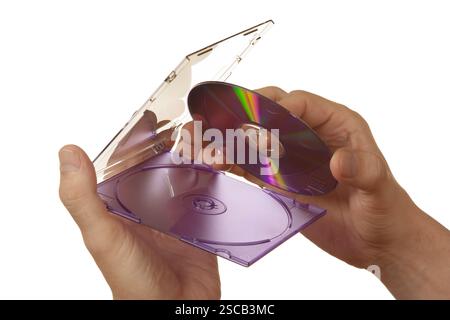 CD-ROM en part isolé sur fond blanc Banque D'Images