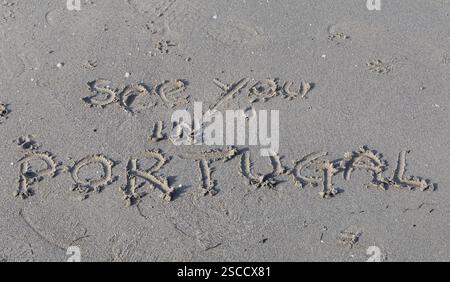 Rendez-vous au Portugal écrit dans le sable Banque D'Images