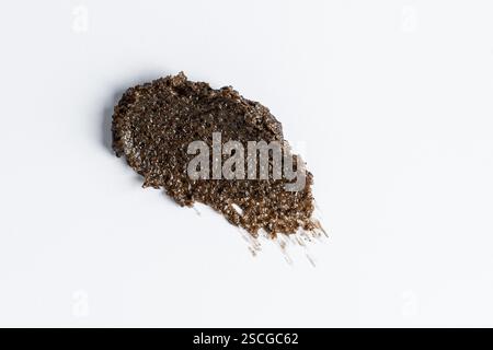 Un frottis de maculage du corps de café brun. Fond de texture. Marketing de présentation des produits Banque D'Images