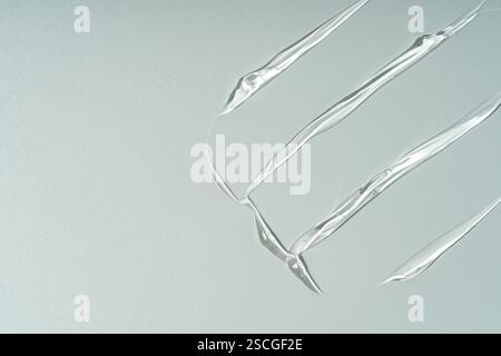 Taches de texture de gel sur un fond vert pastel Banque D'Images