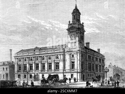 The Holborn Townhall, [Londres], 1880. Nouveau bâtiment "...pour l'hébergement des bureaux publics du Conseil des travaux du district de Holborn..., qui se trouve dans Gray's-inn-Road, à l'angle de Clerkenwell-Road... les architectes étaient messieurs Isaacs et Florence... les constructeurs étaient messieurs Browne et Robinson... ; et le coût total, y compris le site, était de &#xa3;50,000. Le site est un morceau de terrain de 120 pieds. par 100 pieds large, et les bâtiments forment trois côtés d'un quadrilatère, une tour marquant l'angle d'intersection des deux voies. La grande salle publique, qui est de 96 pieds. par 45 pieds large et 32 Banque D'Images