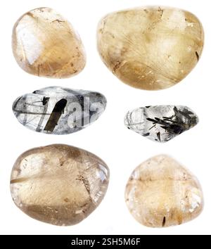 divers spécimens de roches de quartz non coupées avec des inclusions découpées sur fond blanc Banque D'Images