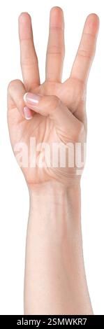 La main montre trois doigts en geste indiquant le numéro trois sur un fond Uni Banque D'Images