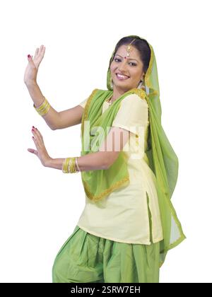 Woman performing Sikh bhangra danse folklorique M.# 702Z Banque D'Images