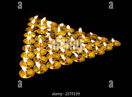 Triangle fait de bougies Banque D'Images