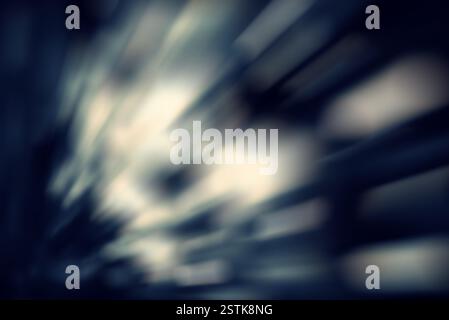 Motion blur flou artistique des taches de lumière sur la mouche noire. Banque D'Images