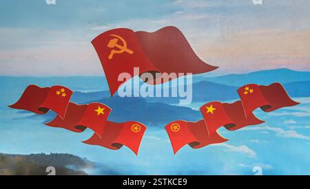 Une peinture historique avec des drapeaux communistes Banque D'Images