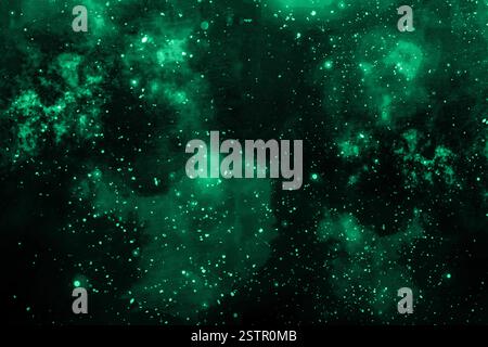 Fond cosmique vert éclatant abstrait avec des particules dispersées et des nébuleuses Banque D'Images