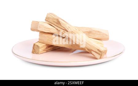 Pile de bâtons de palo santo sur fond blanc Banque D'Images