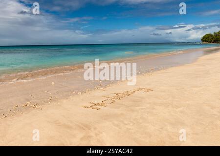 Tobago Beach front de mer vacances mot witten dans le sable Banque D'Images