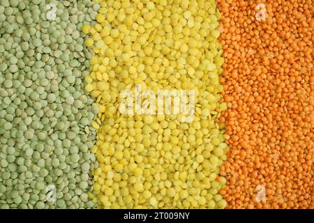 aliments de base produits comme lentilles dans les couleurs vert, rouge, orange, jaune pour les restaurants végétaliens végétariens ou le commerce de produits céréaliers. rayures Banque D'Images