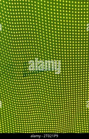 Motif géométrique abstrait de points jaunes ondulés Banque D'Images