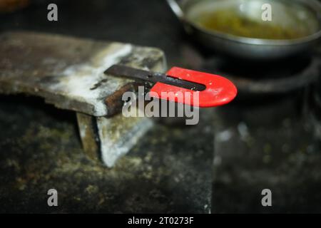 Grate de 25 ans dans une cuisine de village Kerala Banque D'Images