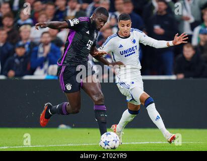 Copenhague, Danemark. 3 octobre, 2023.Copenhague, Danemark. 03 octobre 2023. Mohamed Elyounoussi du FC Copenhagen et Alphonso Davies du FC Bayern Munich lors du match de Ligue des Champions entre le FC Copenhagen et le FC Bayern Munich, deuxième tour du Groupe A, à Parken, Copenhague, mardi 3 octobre, 2023. (photo : Liselotte Sabroe/Ritzau Scanpix) crédit : Ritzau/Alamy Live News Banque D'Images