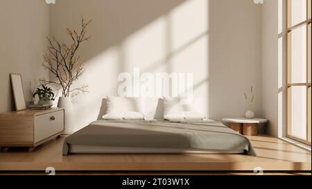 Vue de face d'une chambre japonaise minimaliste design intérieur avec un lit confortable sur un plancher en bois, un tiroir en bois, un grand vase avec fleur, un wal blanc Banque D'Images