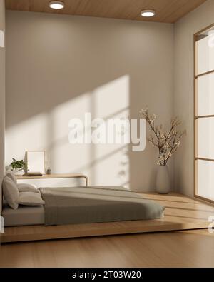 Vue latérale d'une chambre japonaise minimaliste design intérieur avec un lit confortable sur un plancher en bois, un tiroir en bois, un grand vase avec fleur, un mur blanc Banque D'Images