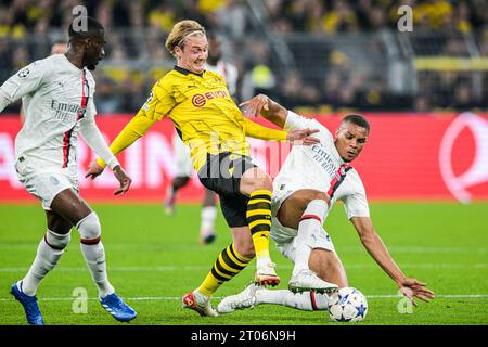 DORTMUND - (de gauche à droite) Julian Brandt du Borussia Dortmund, Malick Thiaw de l'AC Milan lors du match de l'UEFA Champions League entre le Borussia Dortmund et l'AC Milan au signal Iduna Park le 4 octobre 2023 à Dortmund, Allemagne. ANP | Hollandse Hoogte | GERRIT VAN COLOGNE Banque D'Images