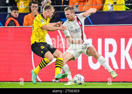 DORTMUND - (de gauche à droite) Julian Ryerson du Borussia Dortmund, Tommaso Pobega de l'AC Milan lors du match de l'UEFA Champions League entre le Borussia Dortmund et l'AC Milan au signal Iduna Park le 4 octobre 2023 à Dortmund, en Allemagne. ANP | Hollandse Hoogte | GERRIT VAN COLOGNE Banque D'Images