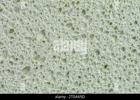 éponge organique poreuse pour laver la vaisselle, texture, fond. Photo de haute qualité Banque D'Images
