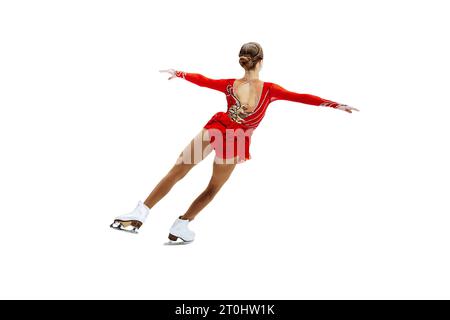 patinage artistique simple, patineuse de figure fille arrière en robe rouge isolé sur fond blanc Banque D'Images