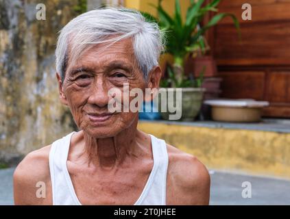 Hoi an, Vietnam. Homme vietnamien âgé Banque D'Images