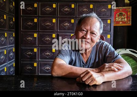 Hoi an, Vietnam. Duc an Old House, Ticket-Taker. Banque D'Images