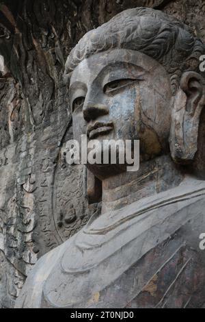 C'est l'une des 51 000 statues des grottes de Yungang, site classé au patrimoine mondial de l'UNESCO et chef-d'œuvre de l'art bouddhiste chinois précoce Les grottes Banque D'Images