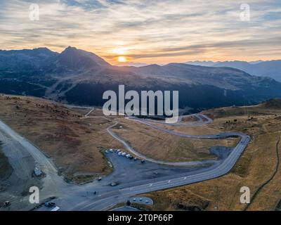 This aerial drone photo shows a group of campers on top of a mountain. The campers are wild camping and enjoying the view in Andorra. Banque D'Images