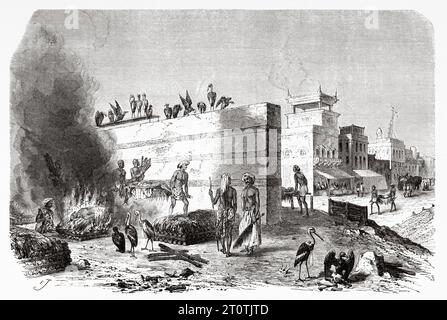 Crémation des morts sur des bûchers funéraires, Calcutta, Inde du Sud, Océan Indien. Gravure ancienne du 19e siècle du Tour du monde 1860 Banque D'Images