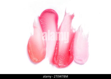Ensemble avec des échantillons cosmétiques de maquillage ipstick, brillant à lèvres sur fond blanc, vue de dessus textures cosmétiques décoratives Banque D'Images