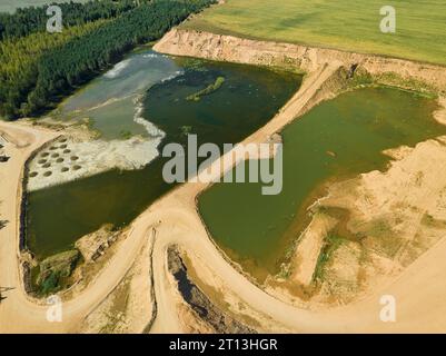 Paysage de sable et processus d'exploitation minière et de production de produits Banque D'Images