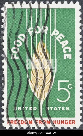 Timbre-poste annulé imprimé par les États-Unis, qui montre blé, nourriture pour la paix - campagne Freedom from Hunger, circa 1963. Banque D'Images