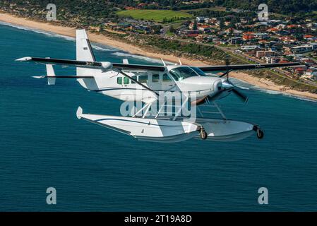 Cessna 208 Caravan avec des flotteurs photographiés air-air. Banque D'Images