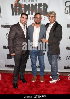 MIAMI, FL-OCT 11 : le producteur, réalisateur Orlando Cicilia III, Carlos Lopez Cantera et l’acteur Eric Roberts sont vus lors de l’avant-première de “HAMMER” au Koubek Center à Miami, Floride, le 11 octobre 2023. (Photo Alberto E. Tamargo/Sipa USA) Banque D'Images