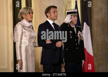 Paris, France, le 12 octobre 2023, M. Macron, président français et son épouse, Brigitte Macron, François Loock/Alamy Live News Banque D'Images