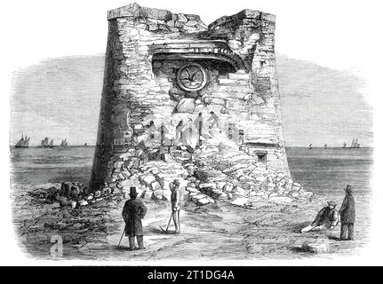 Destruction de la tour Martello, Eastbourne, Sussex, par les canons de Sir W. Armstrong, à une distance de 1032 yards, 1860. « Les canons utilisés étaient un canon de 40 livres de 31 pick, un canon de 80 livres de 63 pick, et un canon court de 100 livres, pesant seulement 53 pick... les projectiles utilisés étaient en partie des tirs solides et en partie des obus à percussion. La tour a été construite en maçonnerie très solide, l'épaisseur des murs étant de 7 pieds. 3 po côté terre, et 9 pieds Sur le côté de la mer... le tir de 80 livres a été trouvé pour passer tout à fait à travers le mur dans la Tour, perçant 7 pieds. 3 po de maçonnerie ; les autres logés dans th Banque D'Images