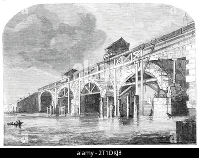 La démolition du vieux pont de Westminster, [Londres], 1860. '...l'ancien pont a duré plus de six cents ans avant que la fondation de son voisin jeune et plus symétrique ne soit posée à Westminster par le comte de Pembroke le 29 janvier 1838...Labelye, l'architecte, qui était un Suisse naturalisé en Angleterre, a exercé la plus grande compétence et le plus grand soin à tous égards pour faire son travail, qui était alors considéré comme l'une des merveilles de l'Europe, aussi complète que possible, les matériaux étaient les meilleurs que l'on pouvait se procurer... des blocs de pierre solide ont été utilisés, beaucoup d'entre eux pesant autant a Banque D'Images