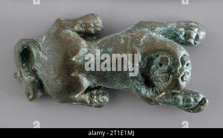 Figurine de Lion assis avec tête tournée, période romaine tardive-période islamique précoce (400-800 EC) ou moderne. Banque D'Images