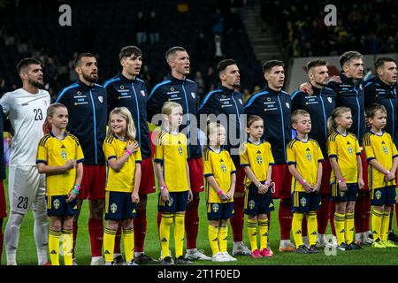 Stockholm, Suède. 12 octobre 2023. Les joueurs moldaves s'alignent pour la rencontre amicale entre la Suède et la Moldavie au Friends Arena de Stockholm. (Crédit photo : Gonzales photo/Alamy Live News Banque D'Images