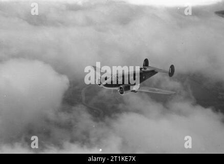 Des avions américains dans la Royal Air Force, 1939-1945- Modèle hêtre 18 Expediter. Service Mark II, HB275, du groupe no 231 vols de communications basé à Alipore, Inde, en vol au dessus de la Birmanie. Banque D'Images