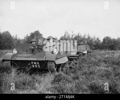 Les hommes d'un bataillon territorial du Highland Light Infantry (ville de Glasgow Regiment) sur un exercice de leurs transporteurs mitrailleuse Bren au Royaume-Uni, 1939. Les hommes d'un bataillon territorial du Highland Light Infantry (ville de Glasgow Regiment) sur un exercice de leurs transporteurs mitrailleuse Bren, 1939. Banque D'Images