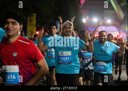 New Delhi, Delhi, Inde. 15 octobre 2023. Les participants prennent part au Vedanta Delhi Half Marathon 2023, à New Delhi, Inde, le 15 octobre 2023. (Image de crédit : © Kabir Jhangiani/ZUMA Press Wire) USAGE ÉDITORIAL SEULEMENT! Non destiné à UN USAGE commercial ! Banque D'Images