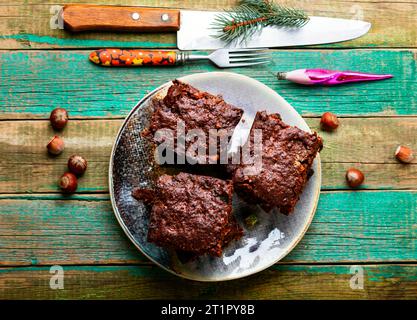 Panforte, tarte de Noël savoureuse à base de fruits secs et de noix. Panforte est un gâteau de Noël italien. Banque D'Images