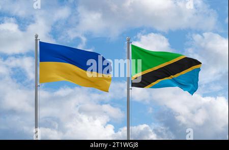 Drapeaux de la Tanzanie et de l'Ukraine agitant ensemble dans le vent sur un ciel nuageux bleu, concept de relation entre deux pays Banque D'Images