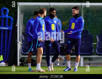 De gauche à droite, les Anglais Jordan Henderson, Marcus Rashford et Declan Rice lors d'une séance d'entraînement au Hotspur Way Training Ground, Londres. Date de la photo : lundi 16 octobre 2023. Banque D'Images