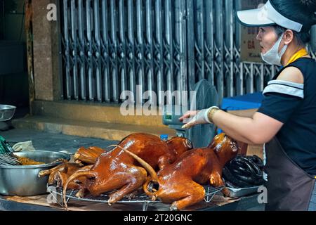 Vendeur de viande de chien, Hanoi, Vietnam Banque D'Images