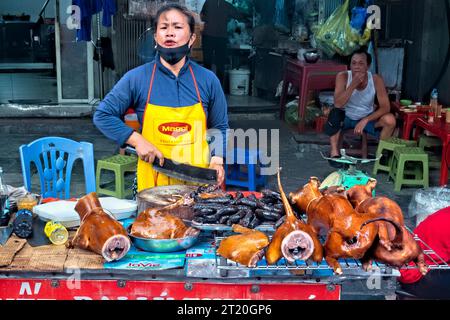 Vendeur de viande de chien, Hanoi, Vietnam Banque D'Images